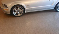 Garage floor with Polyaspartic Coating application.